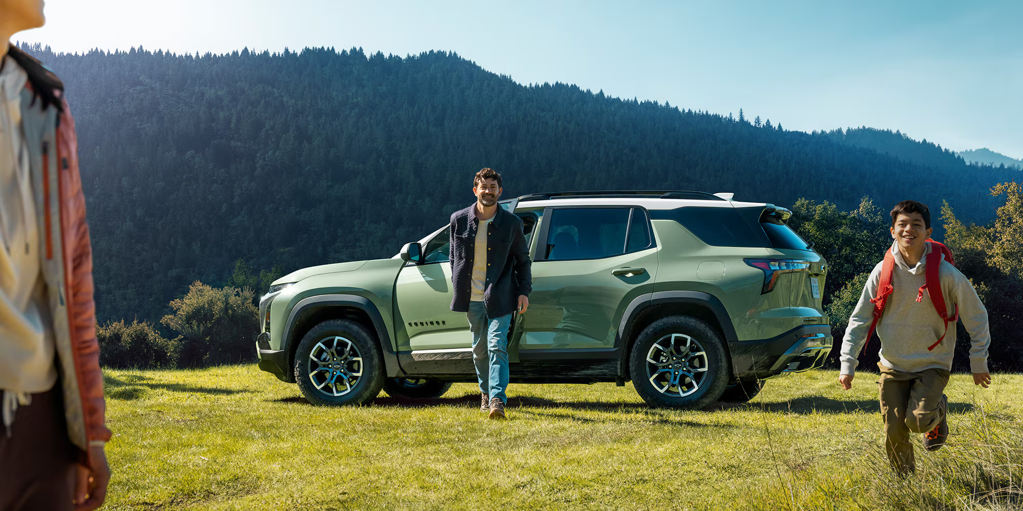 Cacti Green 2025 Chevy Equinox SUV with family