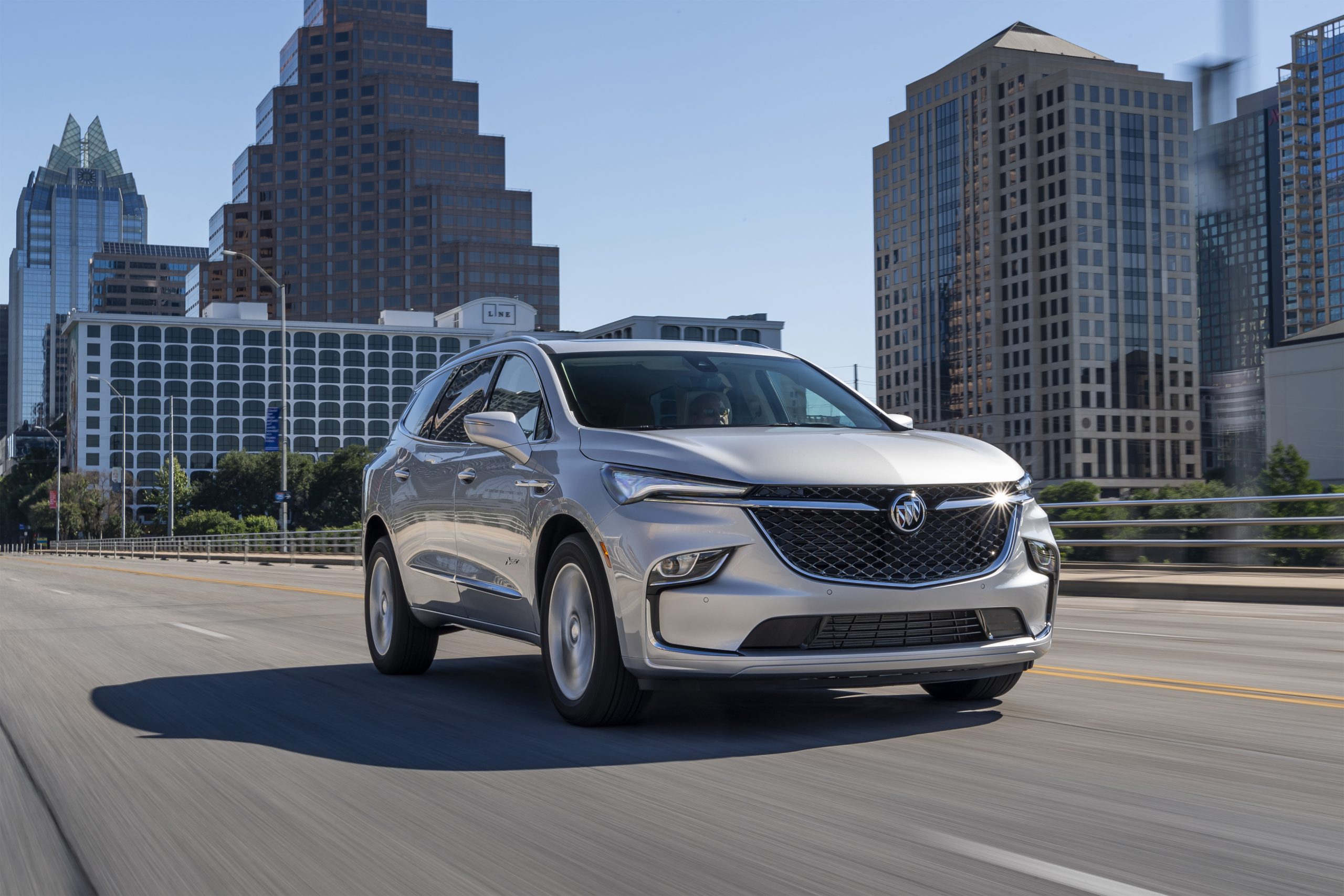 2022 Buick Enclave Avenir on the road in a city.