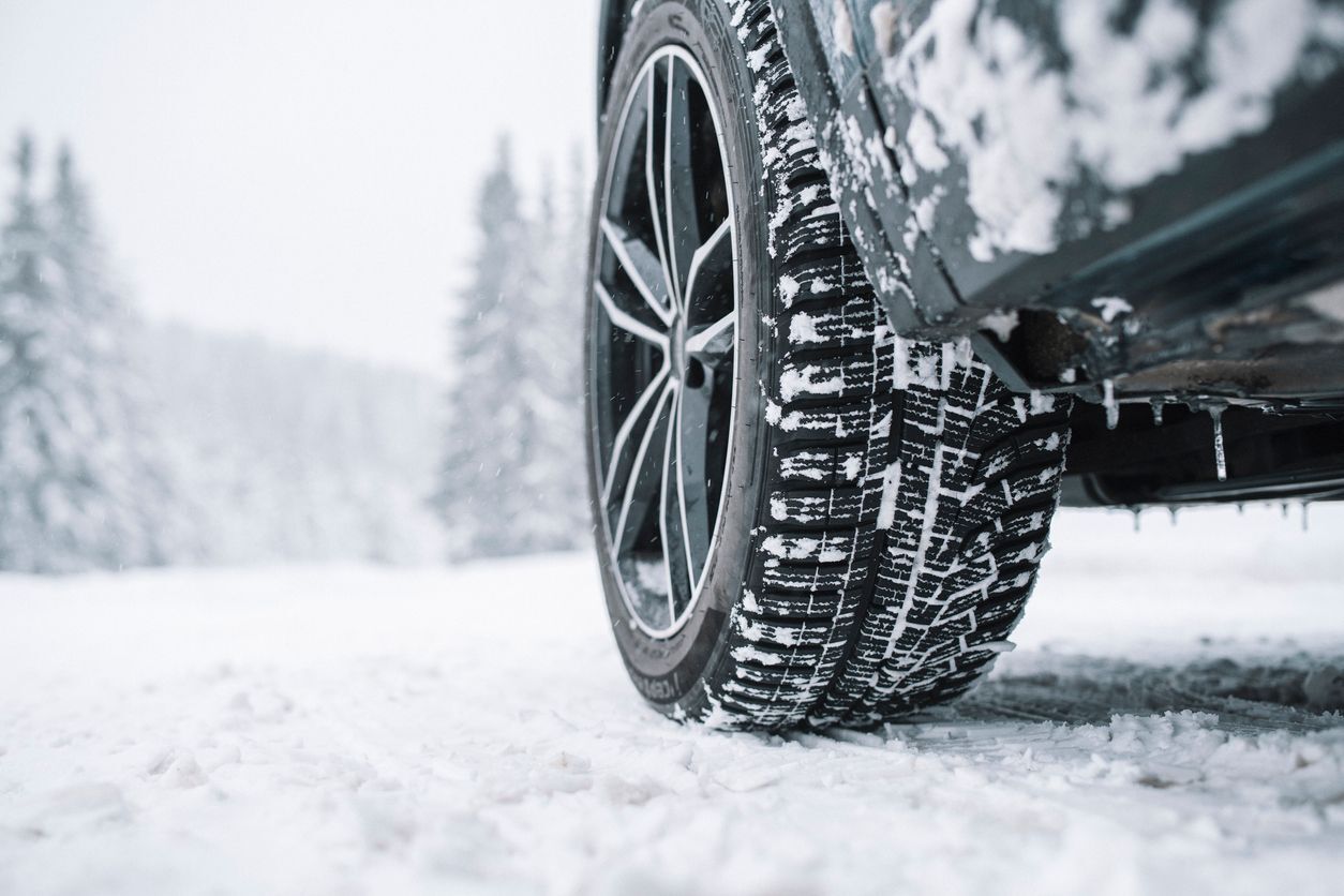 Car tire in the snow