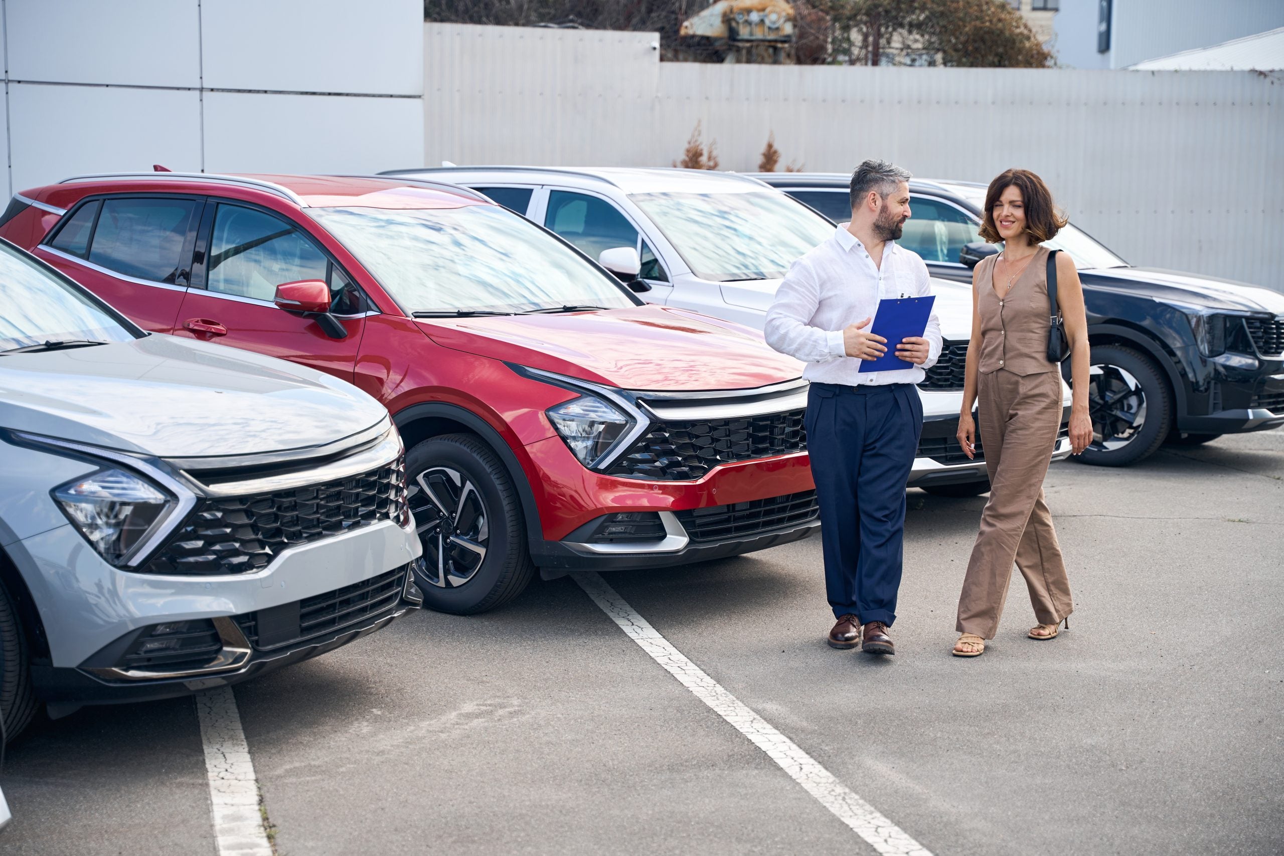 Customer walking through dealership lot
