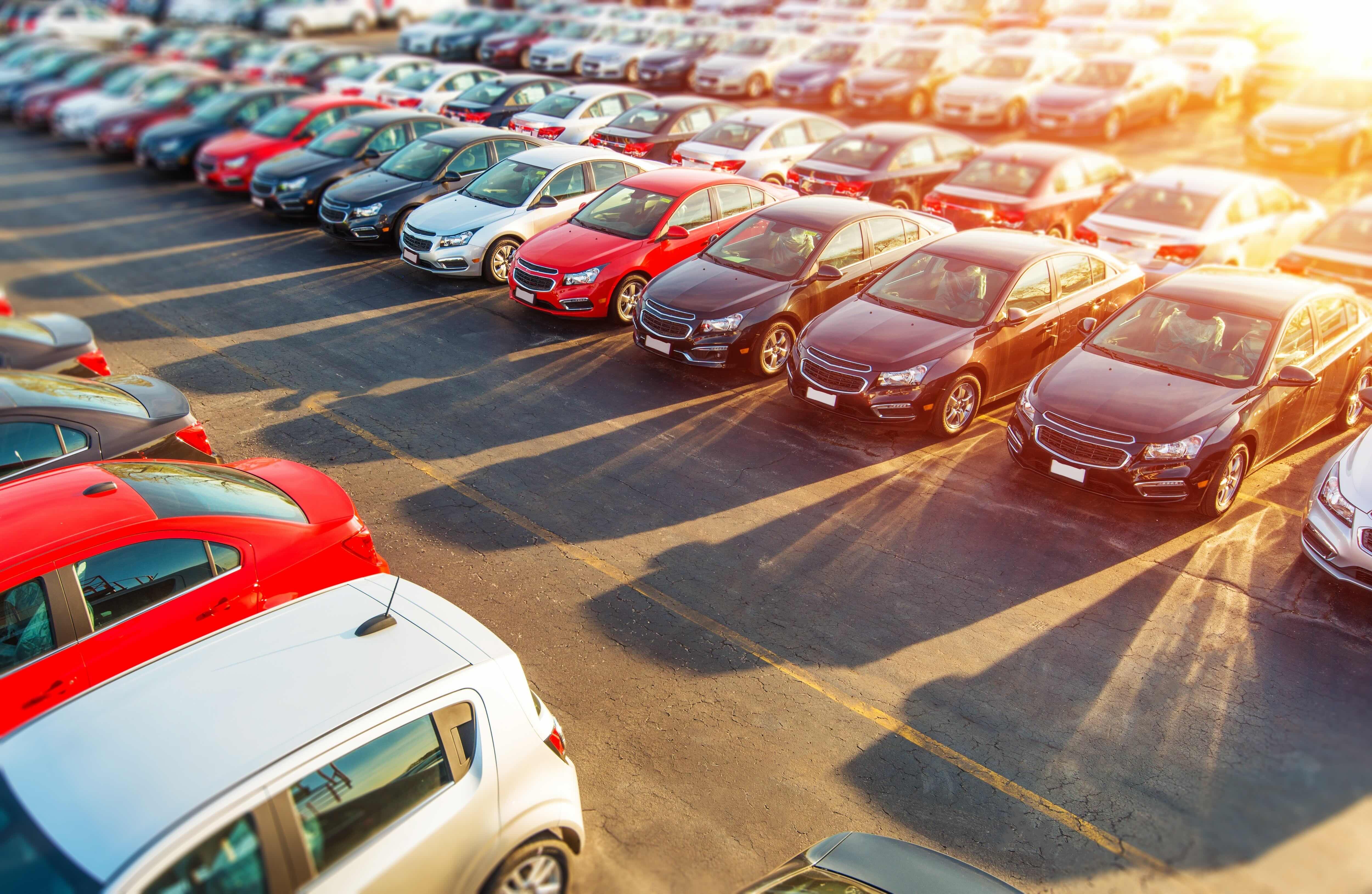 Car lot at sunset